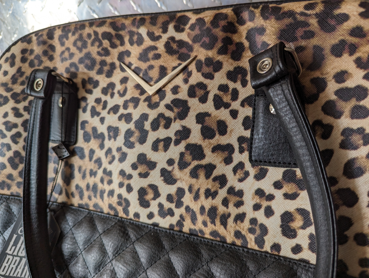 LEOPARD HANDBAG