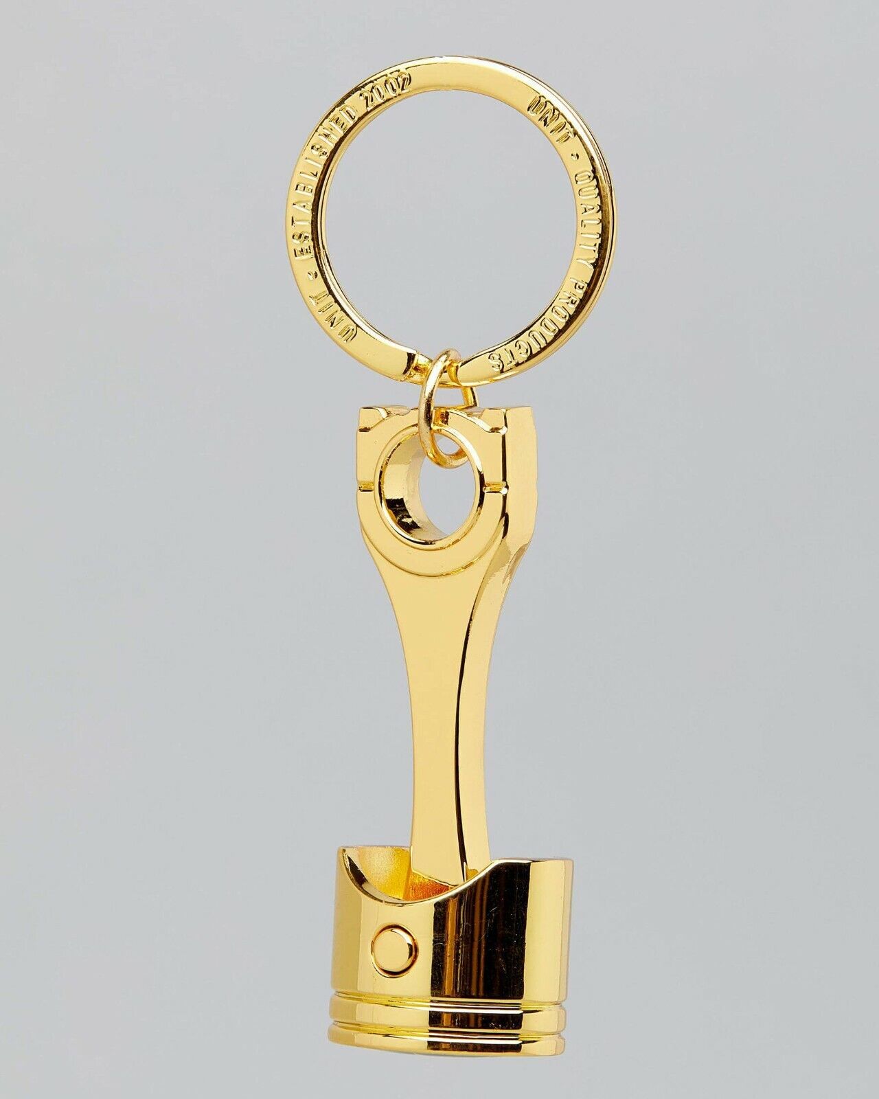 GOLD PISTON KEYRING